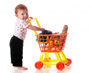 child in shopping trolley